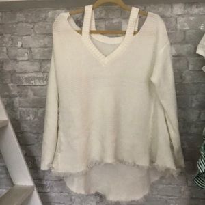 Whit sweater with cut out shoulders